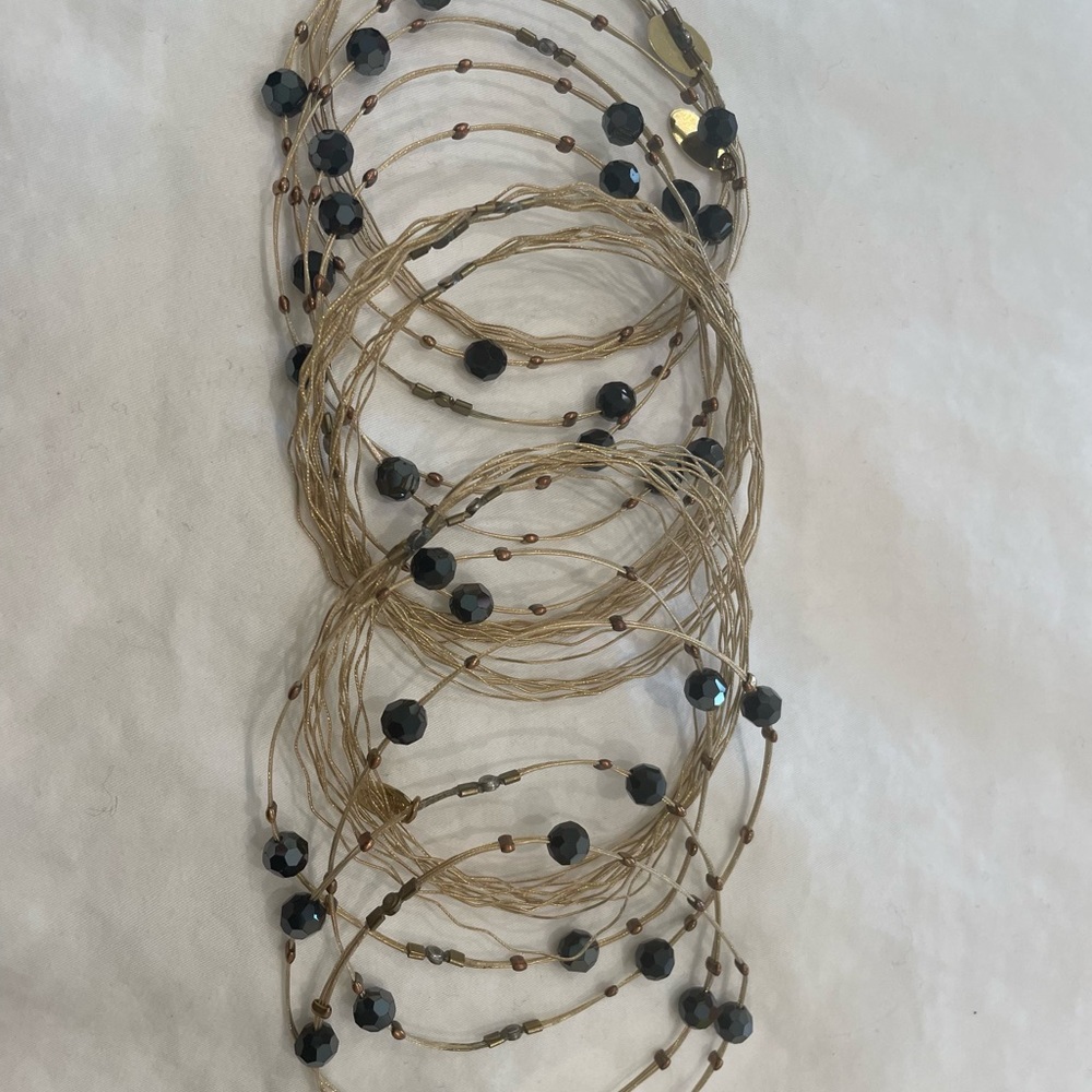 Black and gold soft bangles from Seasonal Whispers Tribeca NYC